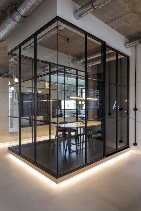 Meeting room in full framed glass walls